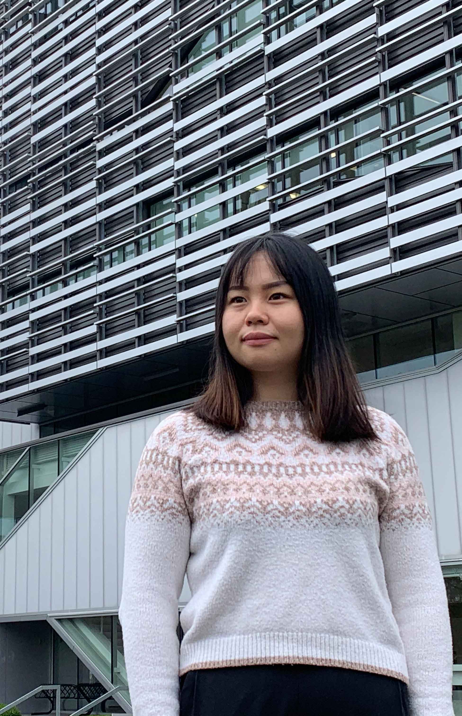 Alumna YunYing Wu in front of the Technology Building