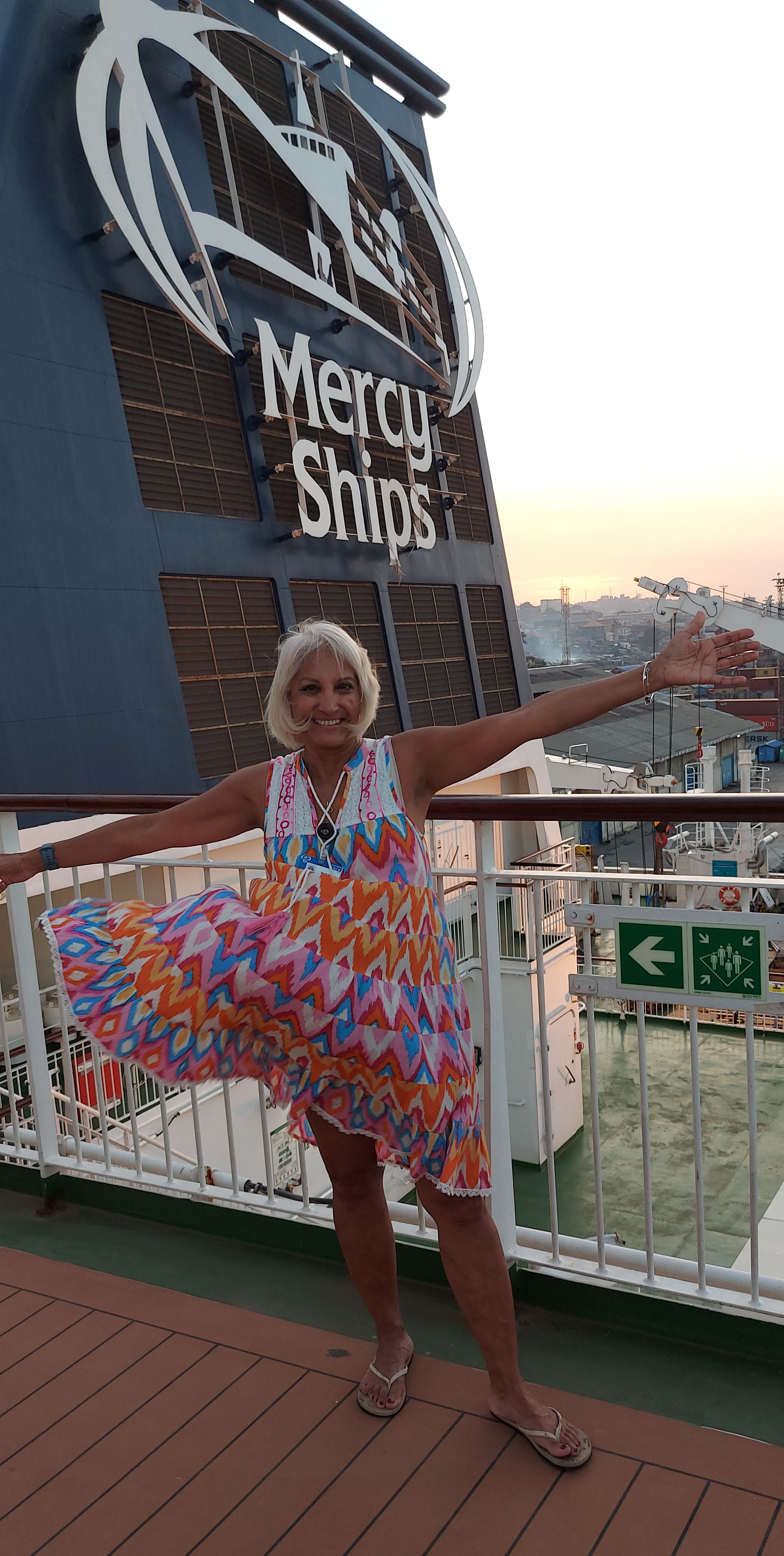 Nursing instructor Shelina Keys posing on the deck of one of Mercy Ships' floating hospitals.