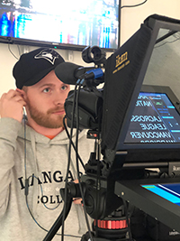 Journalism student behind the camera